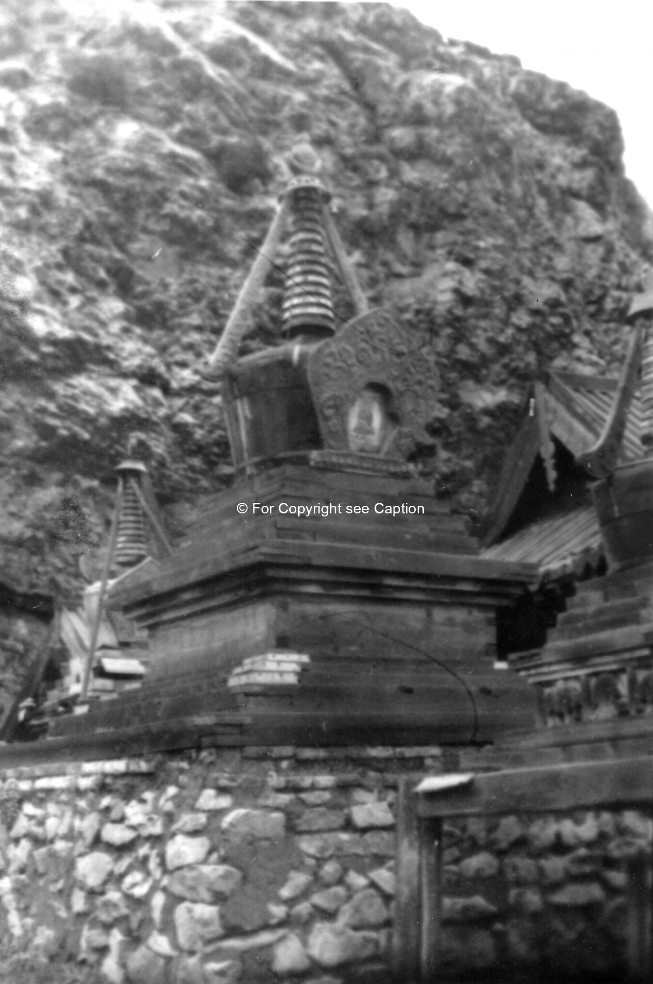 Wooden stupas. Film Archives ?